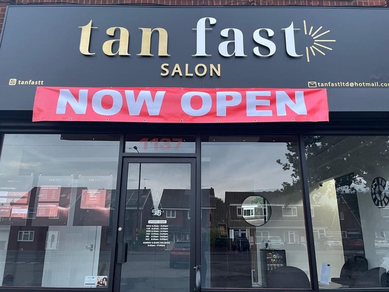 Tan Fast Salon shopfront with the tan fast SALON sign above the glass entrance